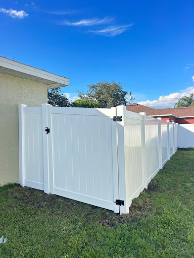 White vinyl gate with black hardware